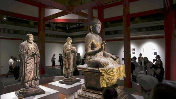 Precious Buddhist statues are seen during a press preview of the exhibition "Expressing Prayer, Capturing Form: Buddhist Sculptures by Unkei from the Northern Round Hall of Kohfukuji Temple," at the Tokyo National Museum in Taito ward, Tokyo.    (Japan News)
