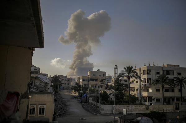 Smoke rises following an Israeli airstrike on Gaza City, Tuesday. (EPA-Yonhap)