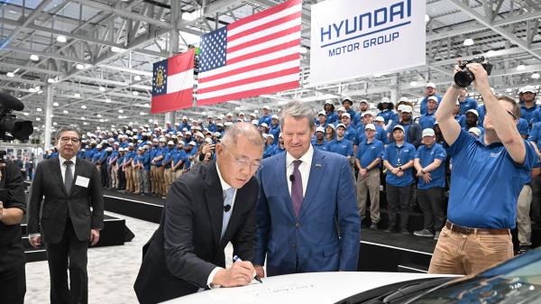 Hyundai Motor Group Executive Chair Chung Euisun (left) and Georgia Gov. Brian Kemp participate the completion ceremony of Hyundai Motor Group Metaplant America in Bryan County, Georgia, on May 26. (Hyundai Motor Group)