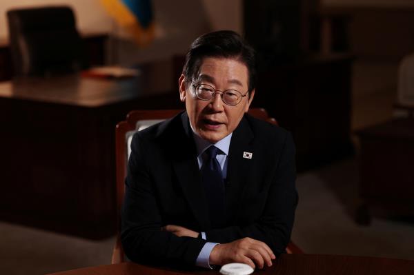 President Lee Jae Myung speaks during an interview with Reuters at the Presidential Office in Seoul, Friday. (Reuters-Yonhap)